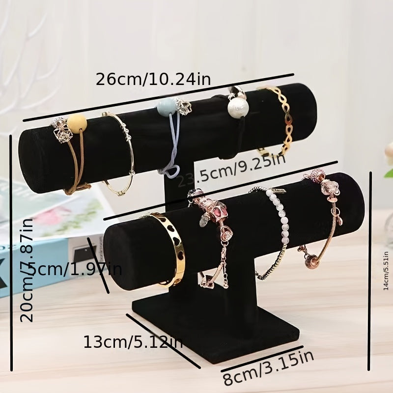 Elegant 3-tier velvet jewelry display stand with wooden base, white marble and black rollers. Multi-level organizer for bracelets, watches, and home decor. Perfect for showcasing in stores or at home. Features elegant design with marble texture.