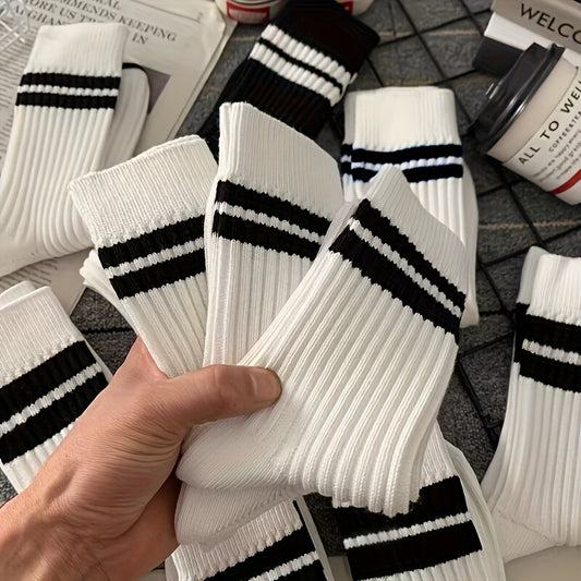 7 pairs of black and white thick mid-length socks for comfortable and breathable wear in autumn and winter.