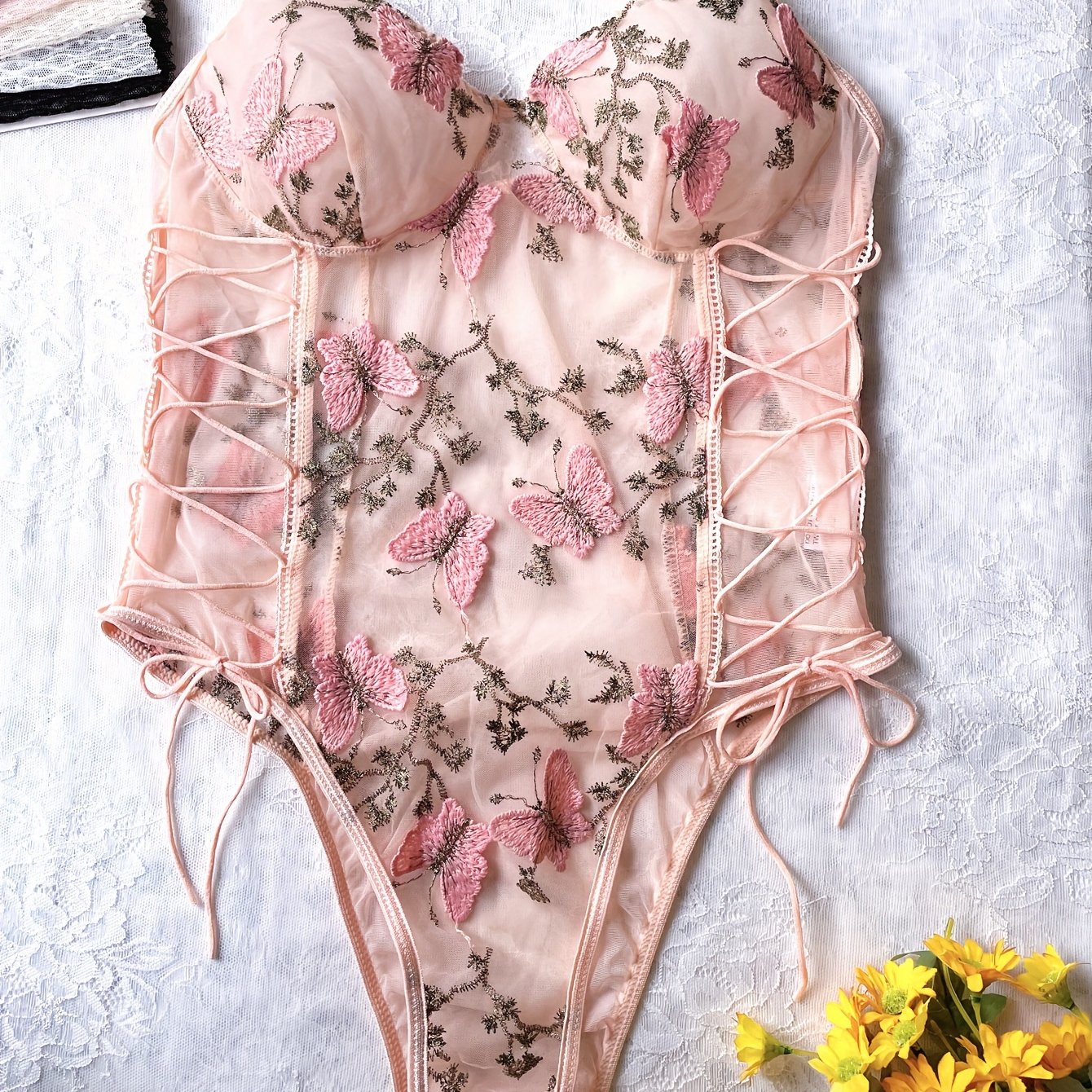 Strappy teddy and backless slip bodysuit with butterfly embroidery for women's sexy lingerie.