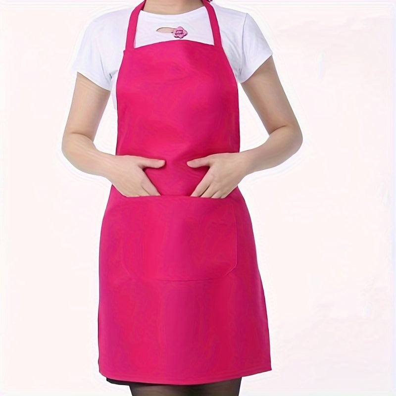 Waterproof adjustable polyester apron with pockets in red, black, and pink. Ideal for cooking, BBQ, and salon use. Great for BBQ essential gear.