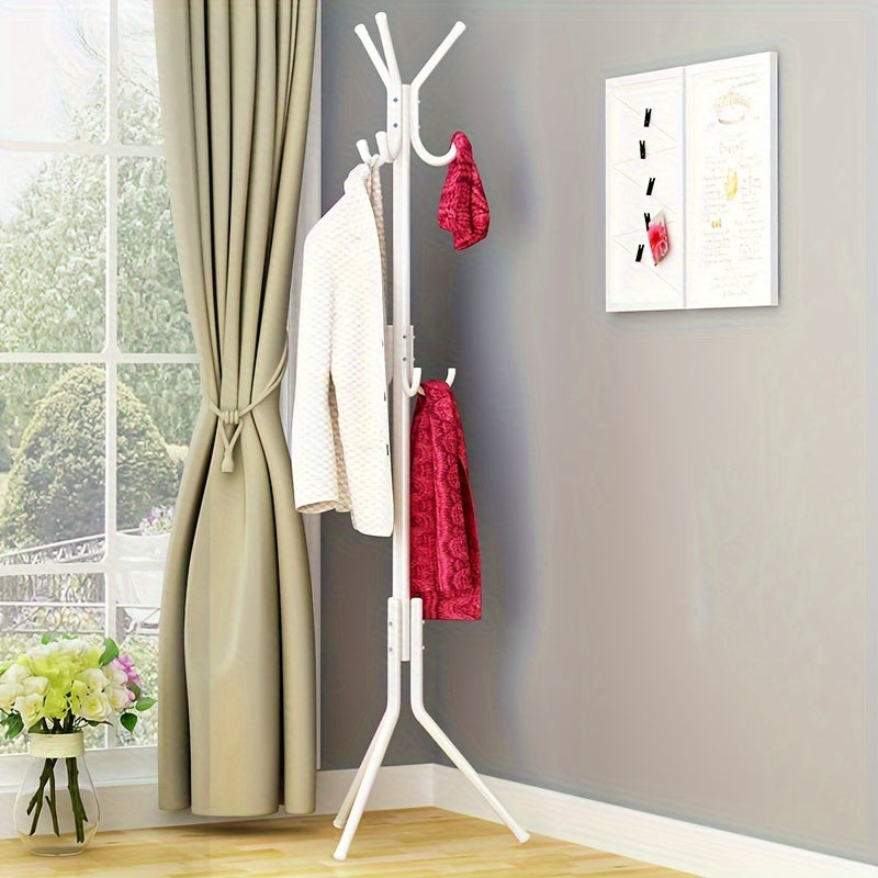 Modern freestanding clothes rack made of wrought iron in black, light blue, and pink. This space-saving design includes hooks for coats, hats, and towels. Easy to assemble and perfect for organizing garments in the bedroom or living room. Can be used for