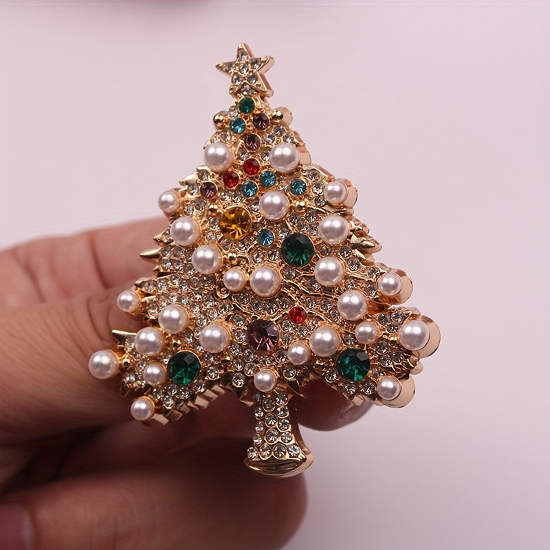 Elegant French designer Christmas tree brooch with luxurious rhinestones, perfect as a women's fashion accessory and novelty pin. This exquisite jewelry piece is ideal for adding a touch of glamour to clothing and makes for a wonderful gift option.