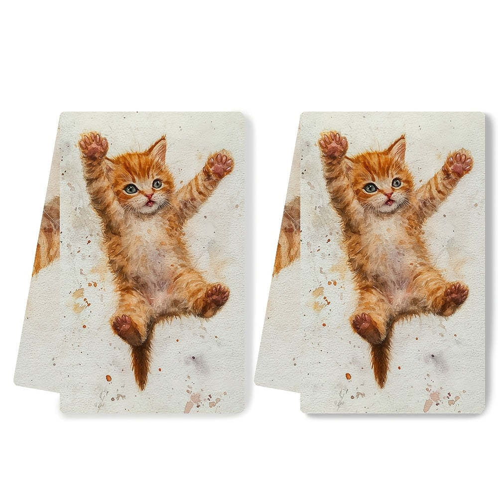 2 pieces of ultra soft kitchen towels featuring an adorable orange kitten learning to jump design. These highly absorbent and machine washable dish hand towels come in a contemporary style measuring 40.64x60.96 cm. Perfect for holiday decor, these dish