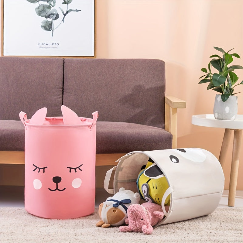 Waterproof fabric toy storage bin with cute cartoon design for kids' toys organization.