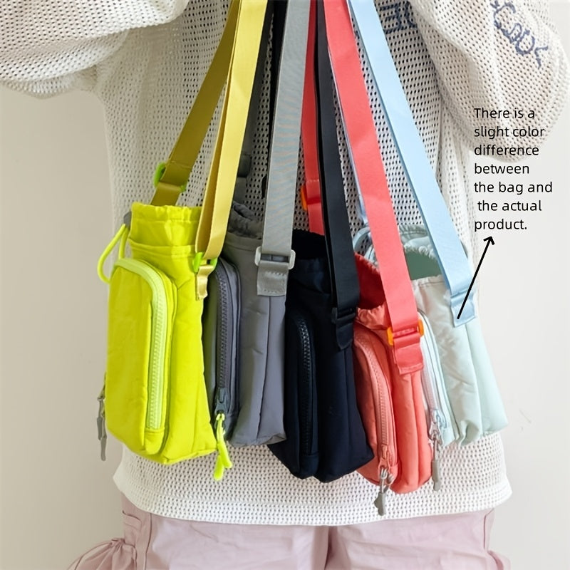 Nylon crossbody bag with water bottle and phone pockets, available in 5 colors, with zip closure.