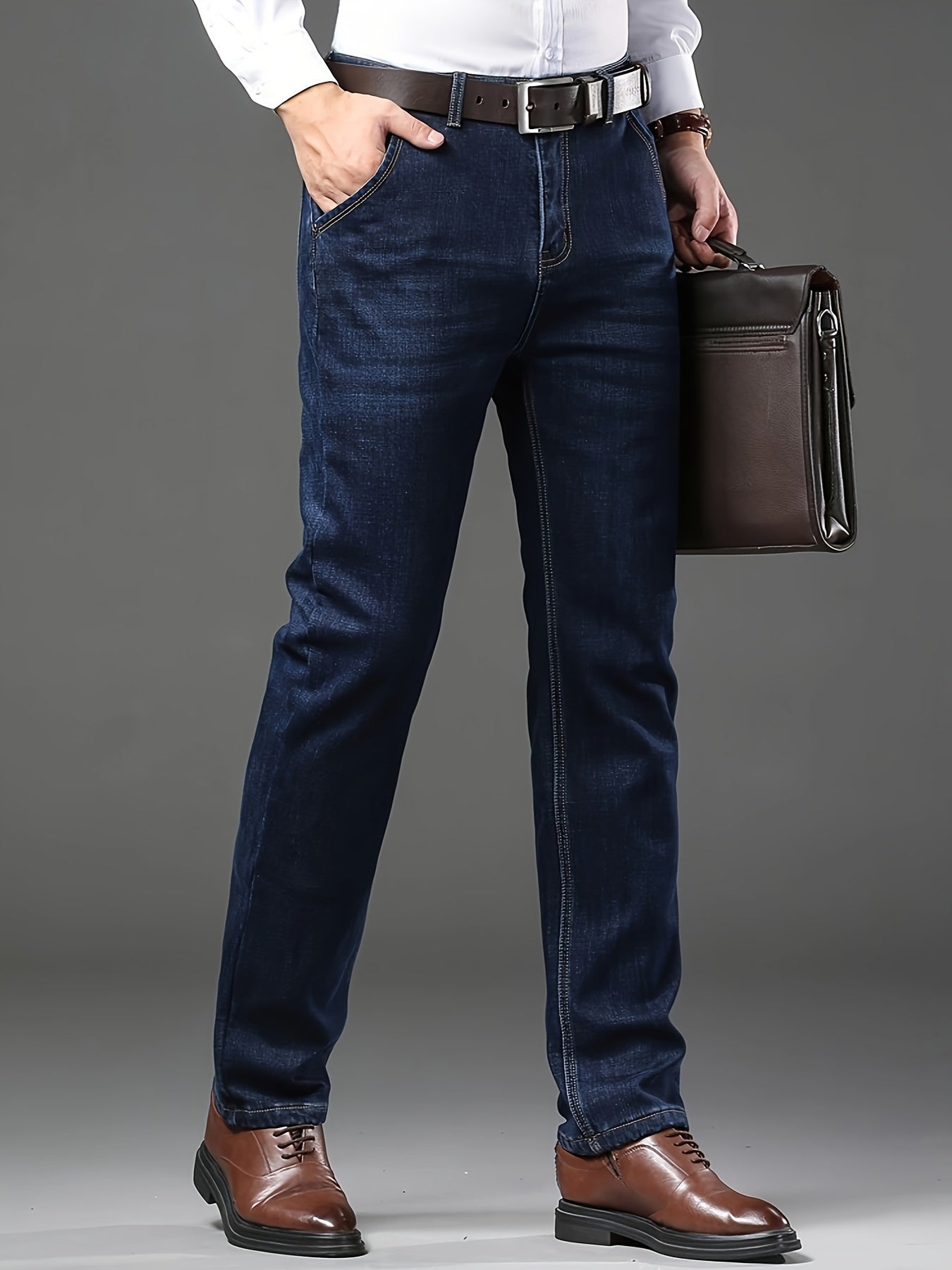 Men's Classic Straight Fit Jeans made of 61.6% Cotton, 36.9% Polyester, and 1.5% Elastane with Regular Length. The jeans have a slight stretch, weigh 260g/m², come in a solid color, are