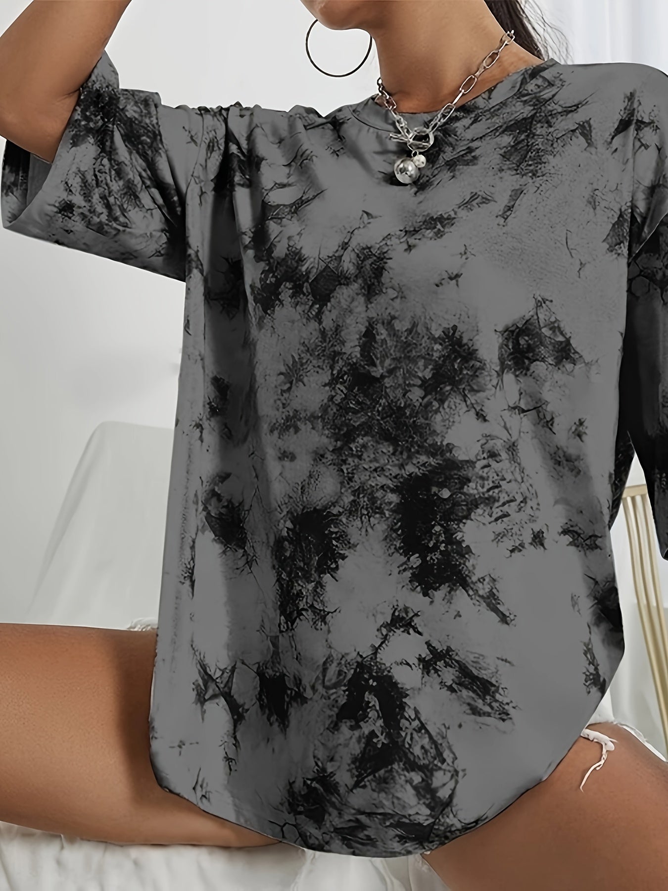 Women's Elegant Floral Print T-Shirt: Soft, stretchy polyester blend, machine washable, short sleeve crew neck for all seasons.