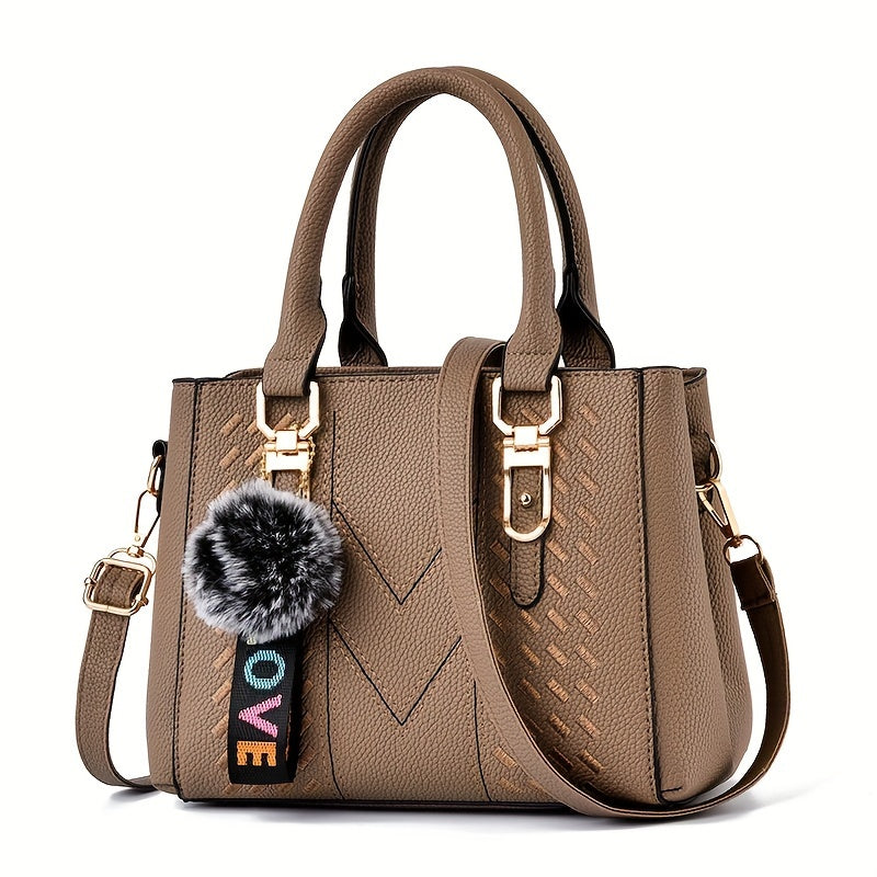 Mother's Day gift bag features women's trendy handbag with ball pendant, simple quilted shoulder crossbody style, perfect for mom and family.