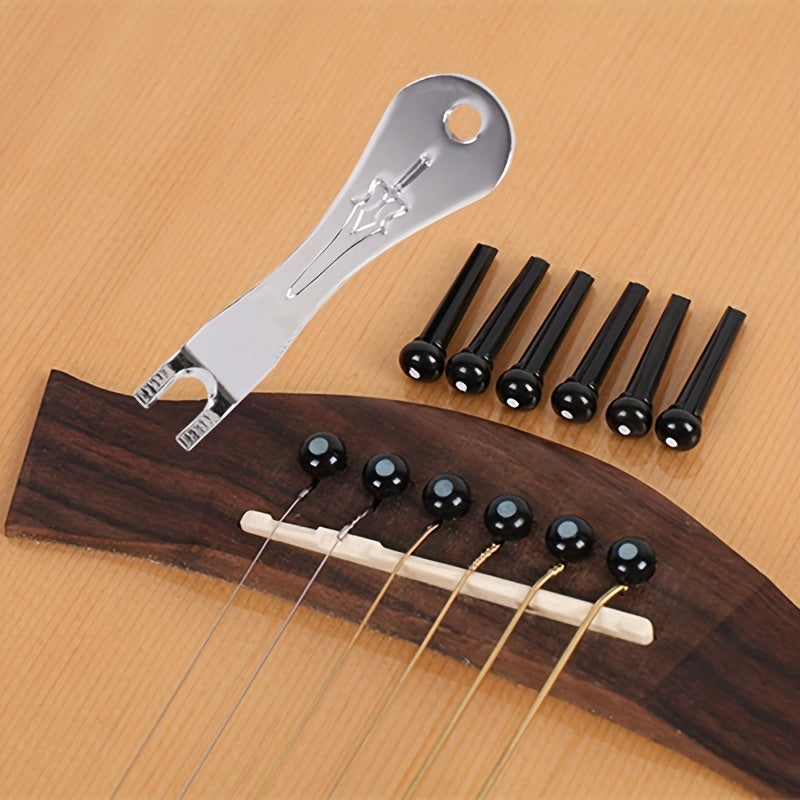 The utility model is a tool for prying, pulling, and removing guitar nails.