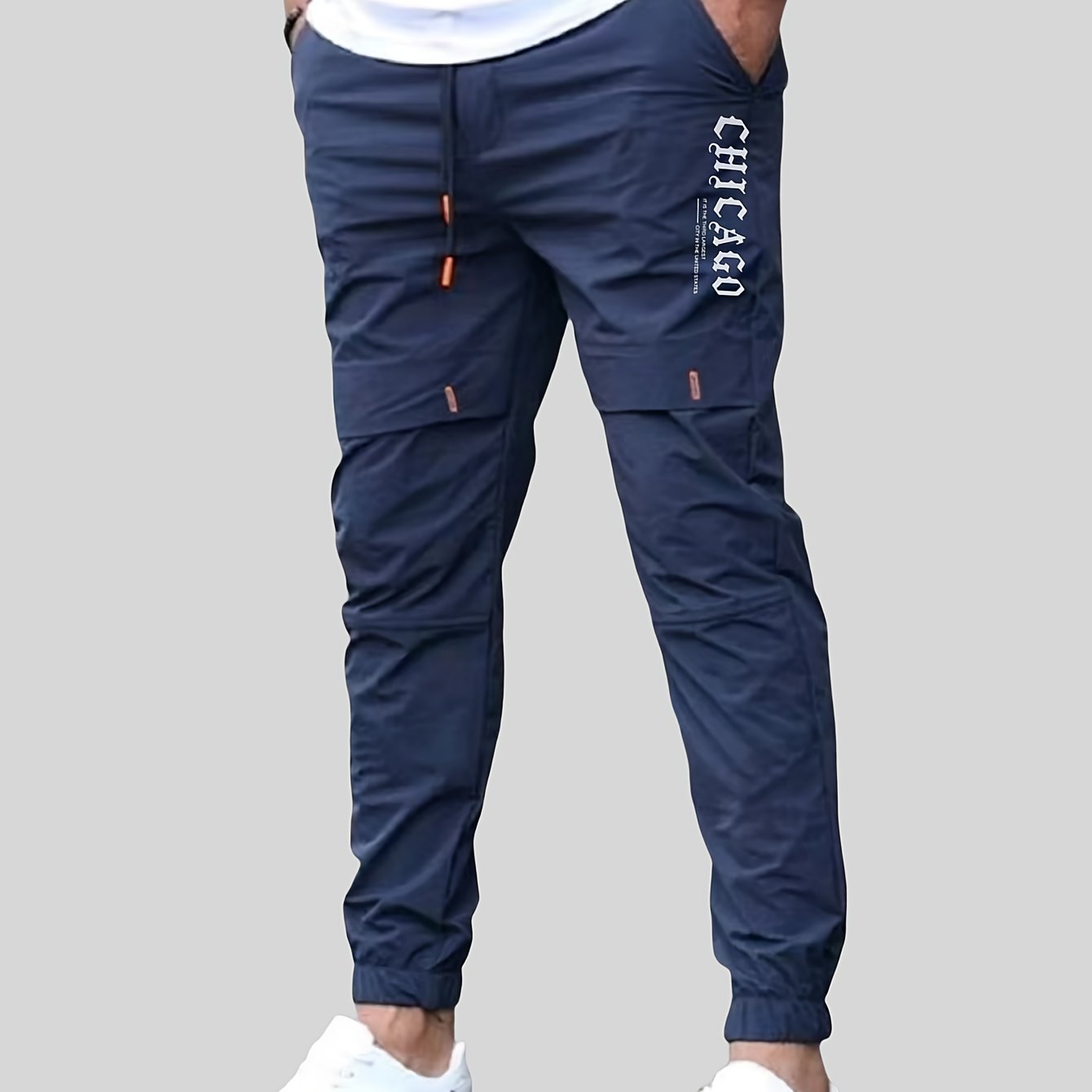 Men's casual joggers made of 100% polyester non-stretch woven fabric with alphabet print detail, suitable for all seasons and featuring a regular fit.