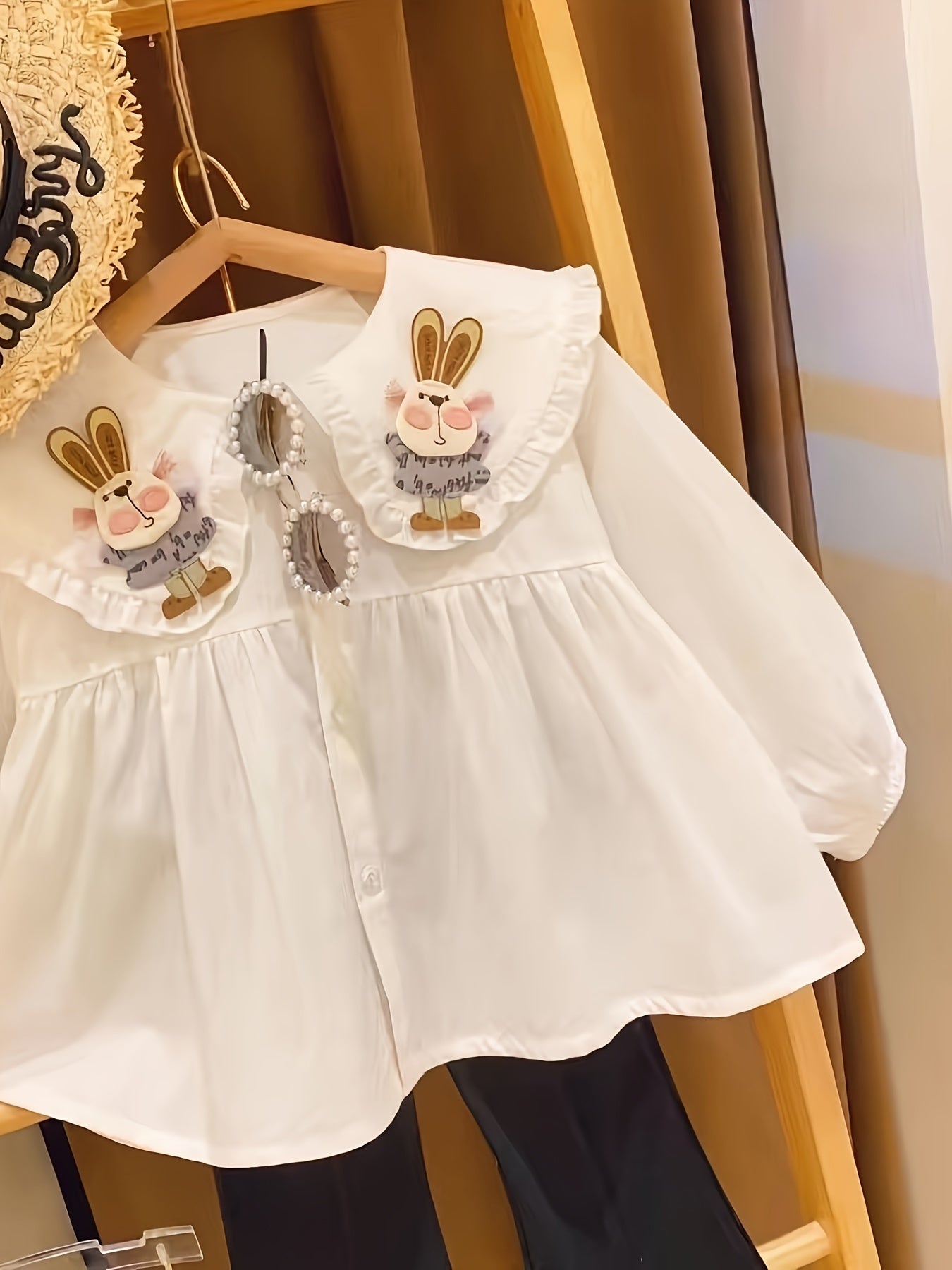 Girls' cotton blouse with bunny pattern and doll collar.