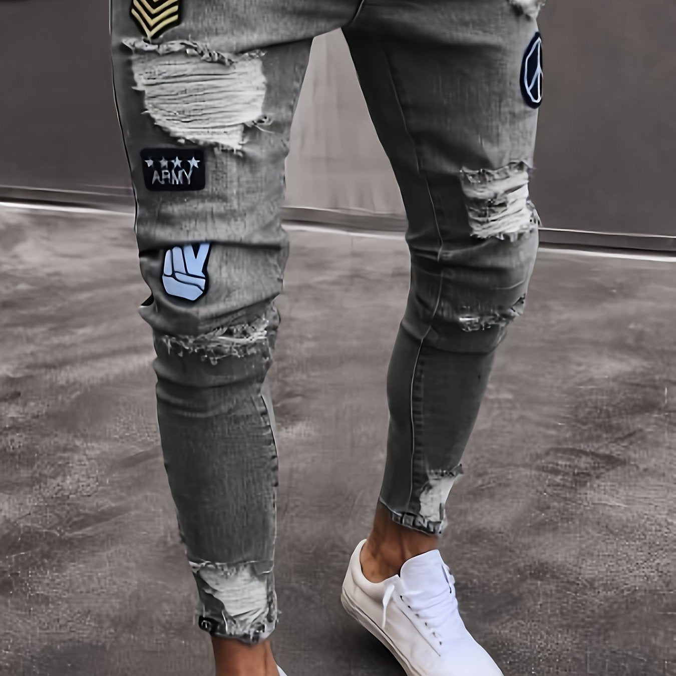 Men's slim fit stretch denim jeans with distressed details, ripped badge accents in grey color.