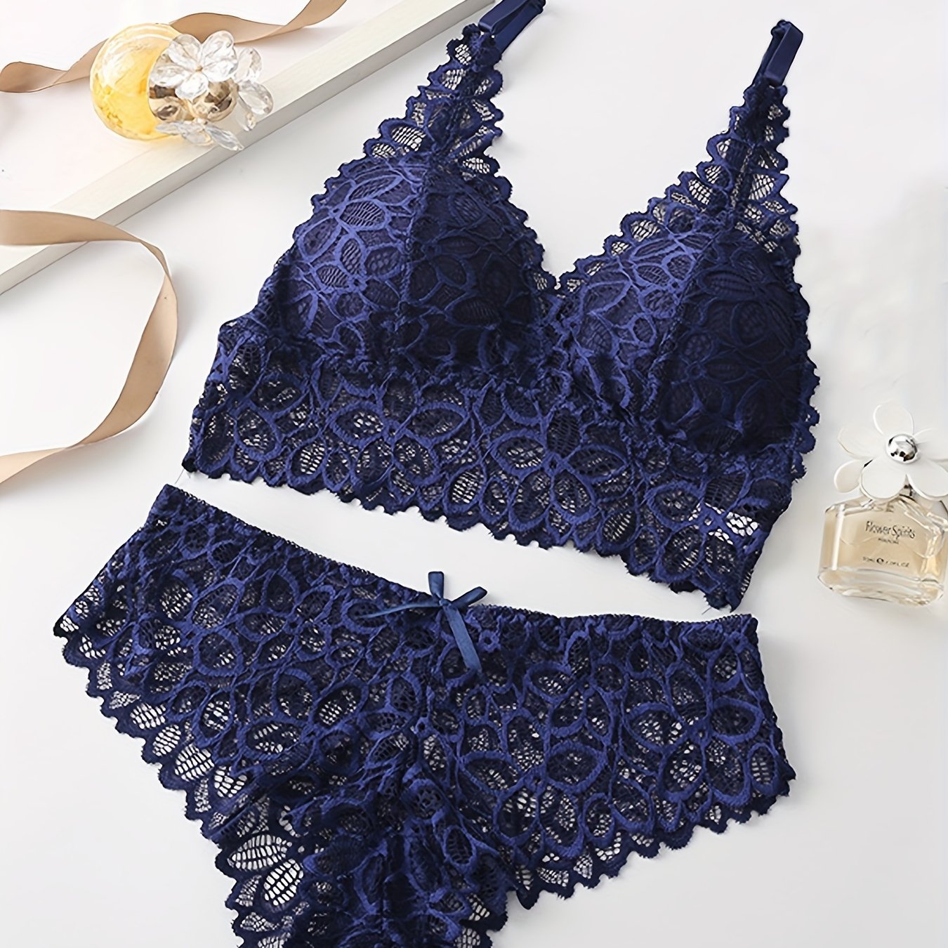 French lace vest-style summer underwear suit with thin mould cup for breathability and comfort.