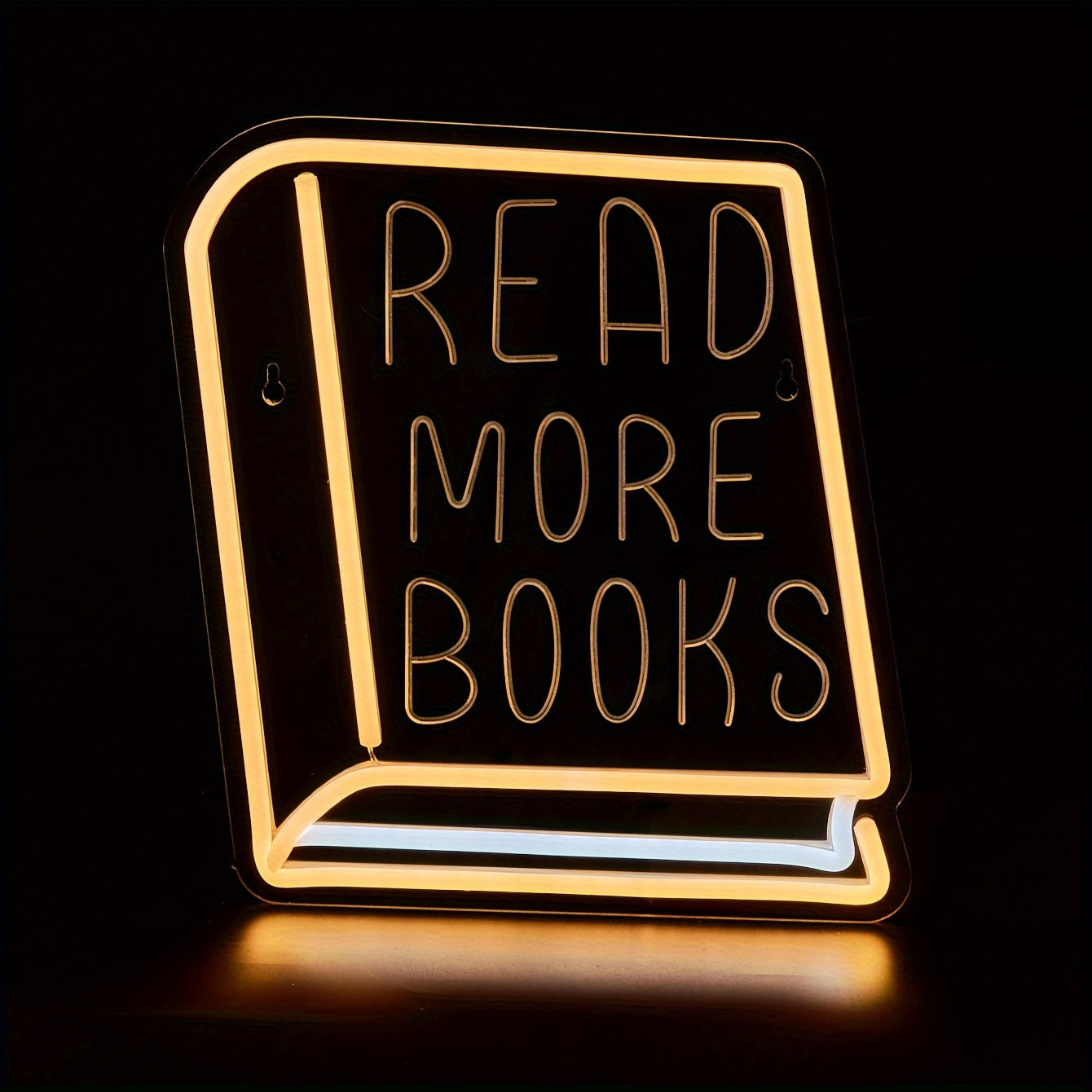 Neon "READ MORE BOOKS" sign for book lovers, perfect for home or office décor. Ideal for girls' bedroom and study area. USB-powered and wall-mounted.