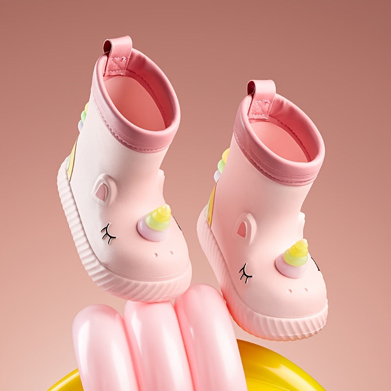 Waterproof Unicorn Cartoon Rain Boots for girls in Pink & White, ideal for outdoor play and school in fall/winter. Made from comfortable EVA material with non-slip soles.