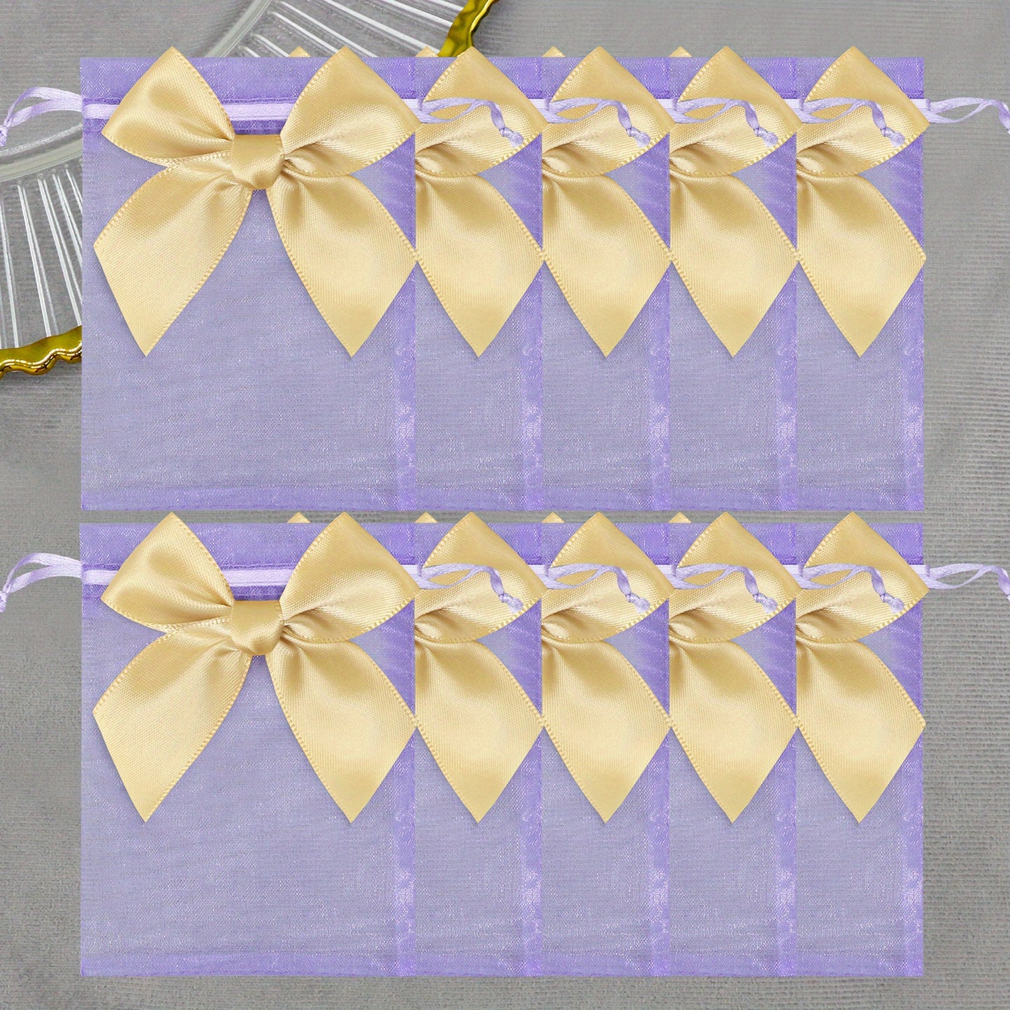 10 elegant organza bags with ribbon and bow, ideal for gift wrapping and party favors.