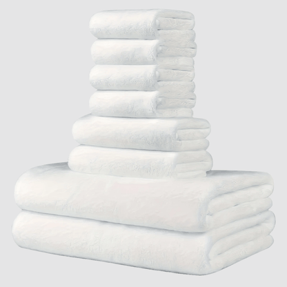 This 8-piece set includes 2 bath towels (68.58 X 139.7 cm), 2 towels (34.8 X 74.93 cm), and 4 square towels (29.97 X 29.97 cm). They are super soft, quick-drying, absorbent, and