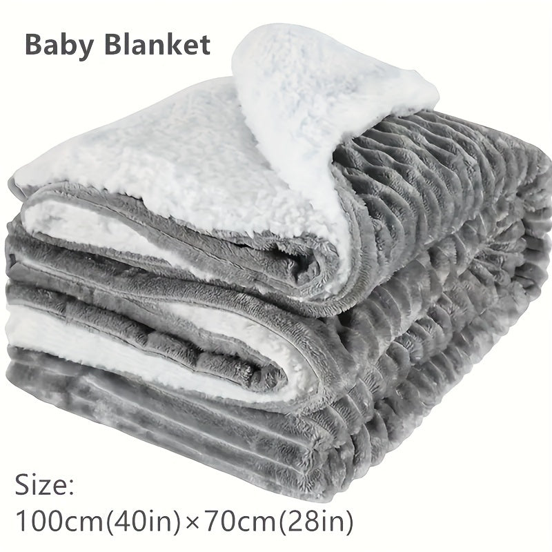 Soft and cozy, this gray fleece baby blanket measures 100 by 75 centimeters. Perfect for travel, it is warm, comfy, and super soft. The plush blanket is ideal for bed, couch, or sofa use. Lightweight and fuzzy, it's perfect for keeping your baby cozy