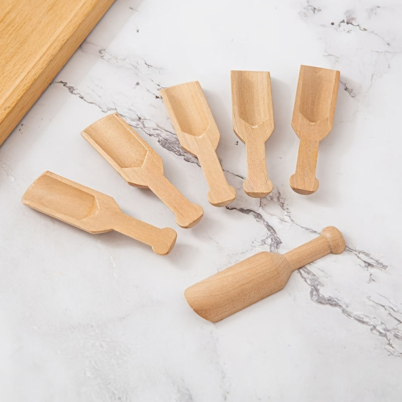 Set of 10 wooden spoons for bath salts, coffee, and tea - perfect for kitchen and dining use. Ideal for use with coffee, tea, and espresso.