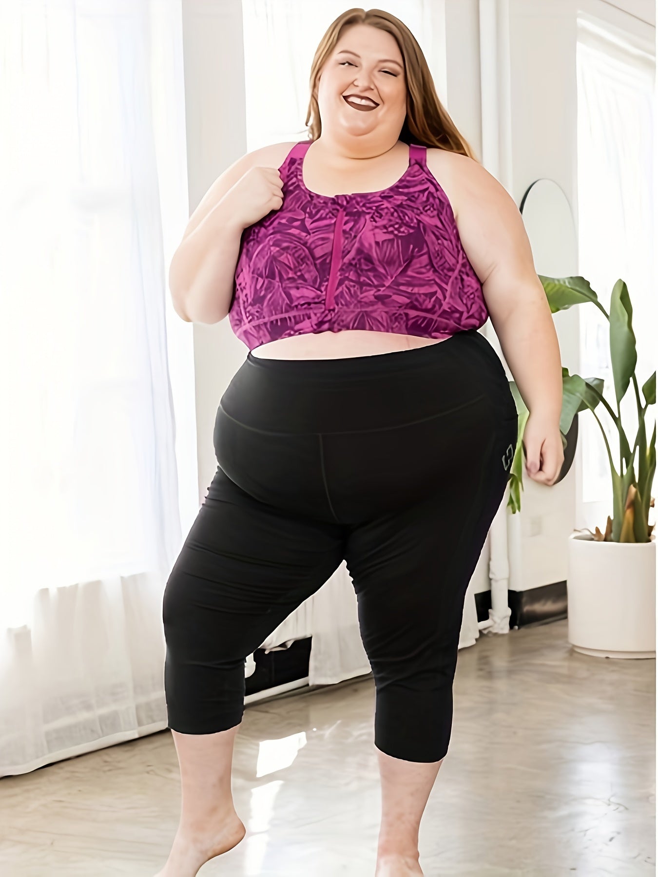 Plus size capri leggings for women, with high waist and tummy control. Features 4X stretch, pocket detail, and solid black color. Made from knit fabric, 92% polyester and 8% spandex