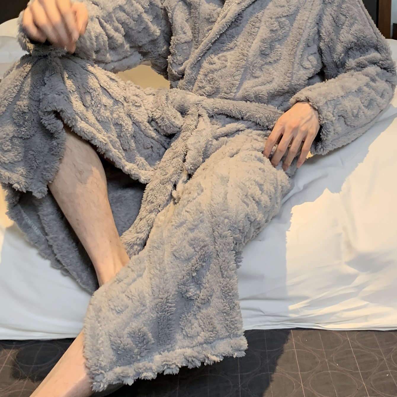 Men's hooded fleece robe for autumn and winter comfort. Soft plush texture, machine washable.