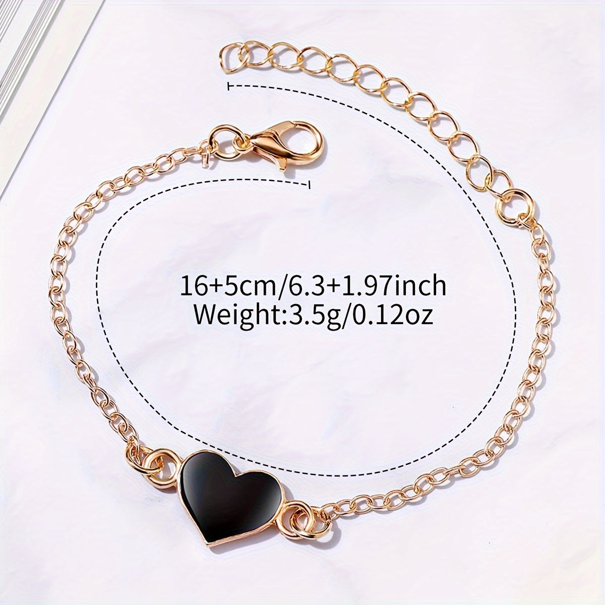 Women's fashion watch set with square dial, PU leather band, alloy case, and heart charm bracelet.