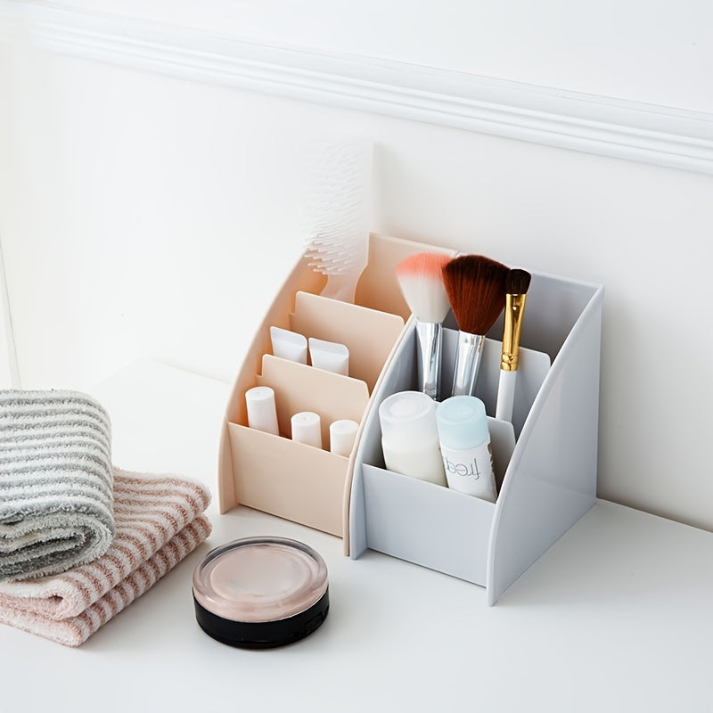 Pocket folder with grid remote control box for organizing cosmetics on desktop.