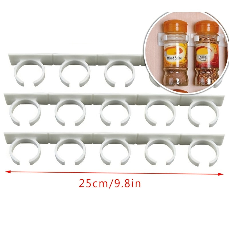 A convenient kitchen organizer, this spice bottle storage rack features a wall-mounted self-adhesive design that can be easily cut to size for simple installation and easy access to all your spices.