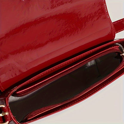 Elegant red baguette bag for women with detachable strap, golden-tone hardware, and glossy finish.