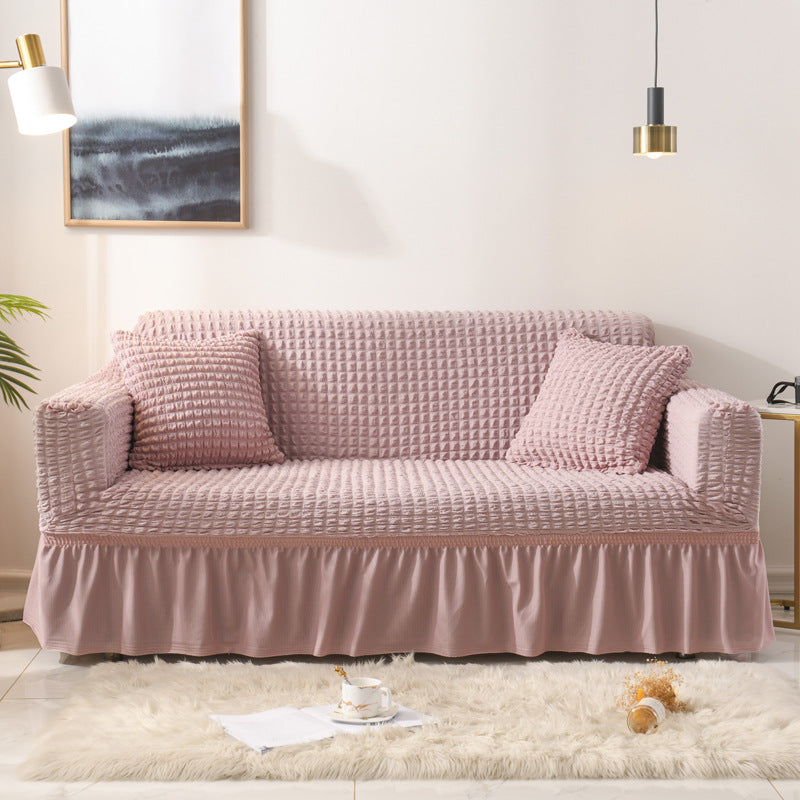 Stretch sofa slipcover with skirt, washable and durable, universal fit.