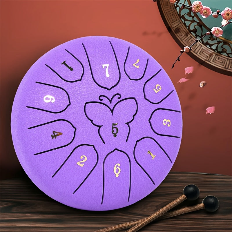 Steel Tongue Drum with 11 Notes, 15.24 cm for Sound Healing and Meditation, includes Carry Bag, Music Book, Sticks, and Accessories.