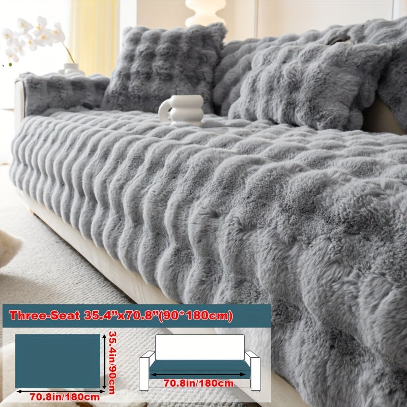 Faux rabbit fur sofa cover for cozy winter warmth. Pet-friendly, machine washable. Fits single to four-seater sofas. Perfect for living room, bedroom, office decor.