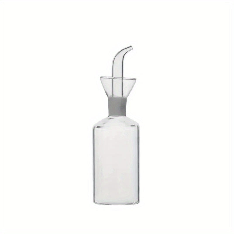 Transparent oil dispenser available in 5oz, 6.7oz, and 15.2oz sizes. This leakproof glass bottle is perfect for storing olive oil, vinegar, and other liquid seasonings. Suitable for cooking, baking, salad, and grilling. A must-have in your kitchen