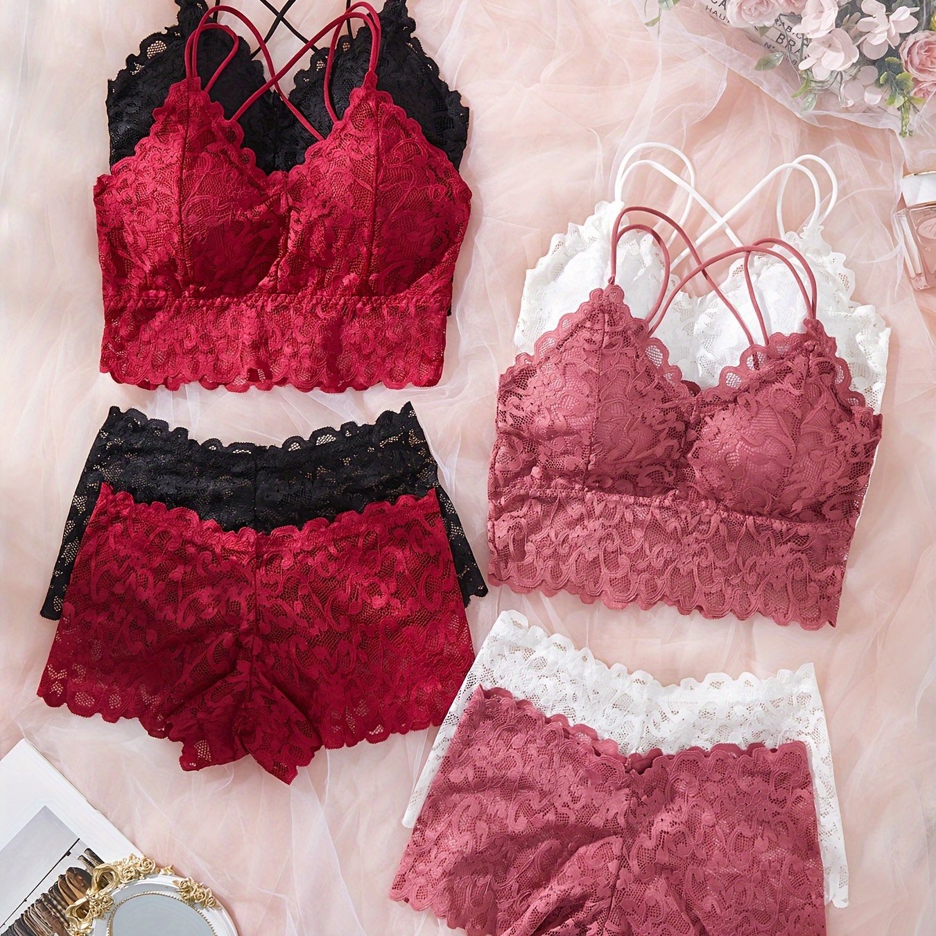 4-Pack of lace lingerie set for women, including solid color bralette and boyshorts without underwire. Made of knit fabric. Ideal for adult females.