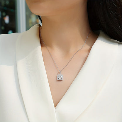 This stylish Moissanite pendant necklace is made of 925 sterling silver and coated with 18K gold, featuring a square halo design. It comes on a collarbone chain and includes a gift box, making it perfect for Valentine's Day, engagements, weddings