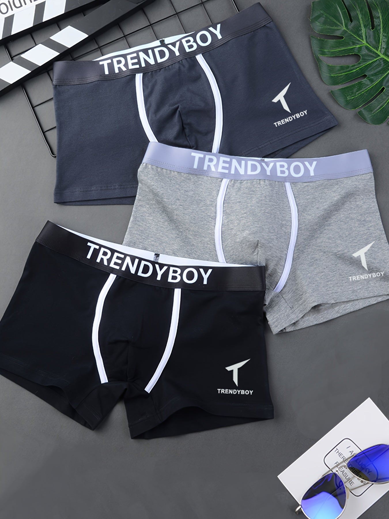 3 TRENDYBOY Men's Boxer Briefs: Soft & breathable polyester blend with comfort fit, elastic waistband, and sleek geometric pattern design for home & sports wear.