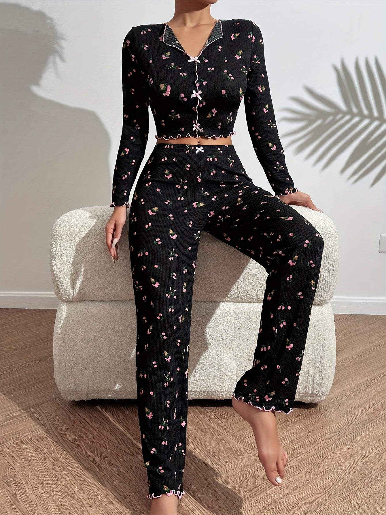 Floral print pajama set with bow detail, long sleeve top and ribbed pants in soft polyester blend - ideal for autumn nights