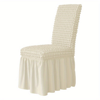 1 Seersucker dining chair slipcover with skirt, non-slip design. Protects furniture in various settings.