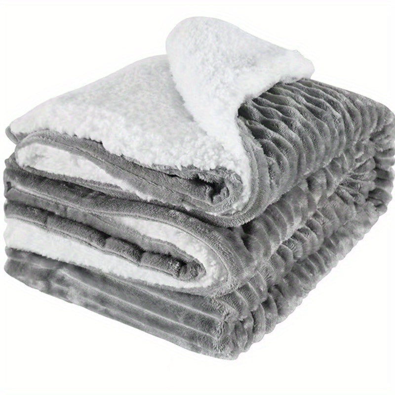 Soft and cozy, this gray fleece baby blanket measures 100 by 75 centimeters. Perfect for travel, it is warm, comfy, and super soft. The plush blanket is ideal for bed, couch, or sofa use. Lightweight and fuzzy, it's perfect for keeping your baby cozy