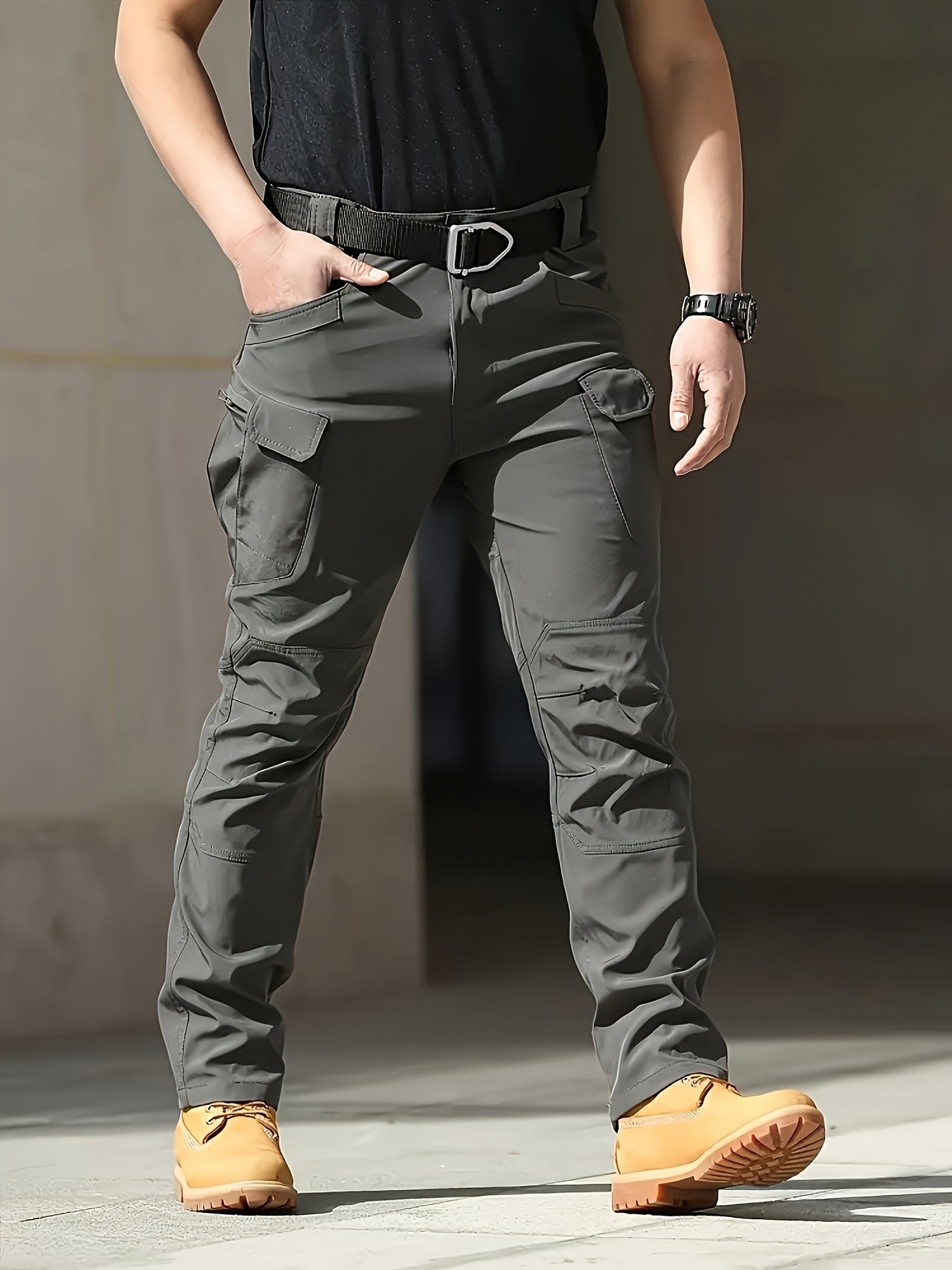 Men's Tactical Cargo Pants in Dark Gray for outdoor and hiking activities, made of durable lightweight polyester with multi-pocket design. Casual military style, machine washable for