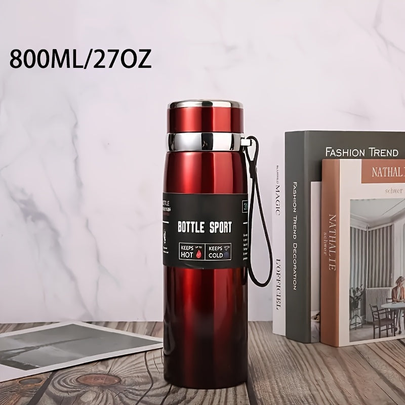 Stainless steel 1000ml vacuum insulated water bottle with portable strap, BPA-free, keeps hot/cold for sports and outdoor activities, hand wash only.