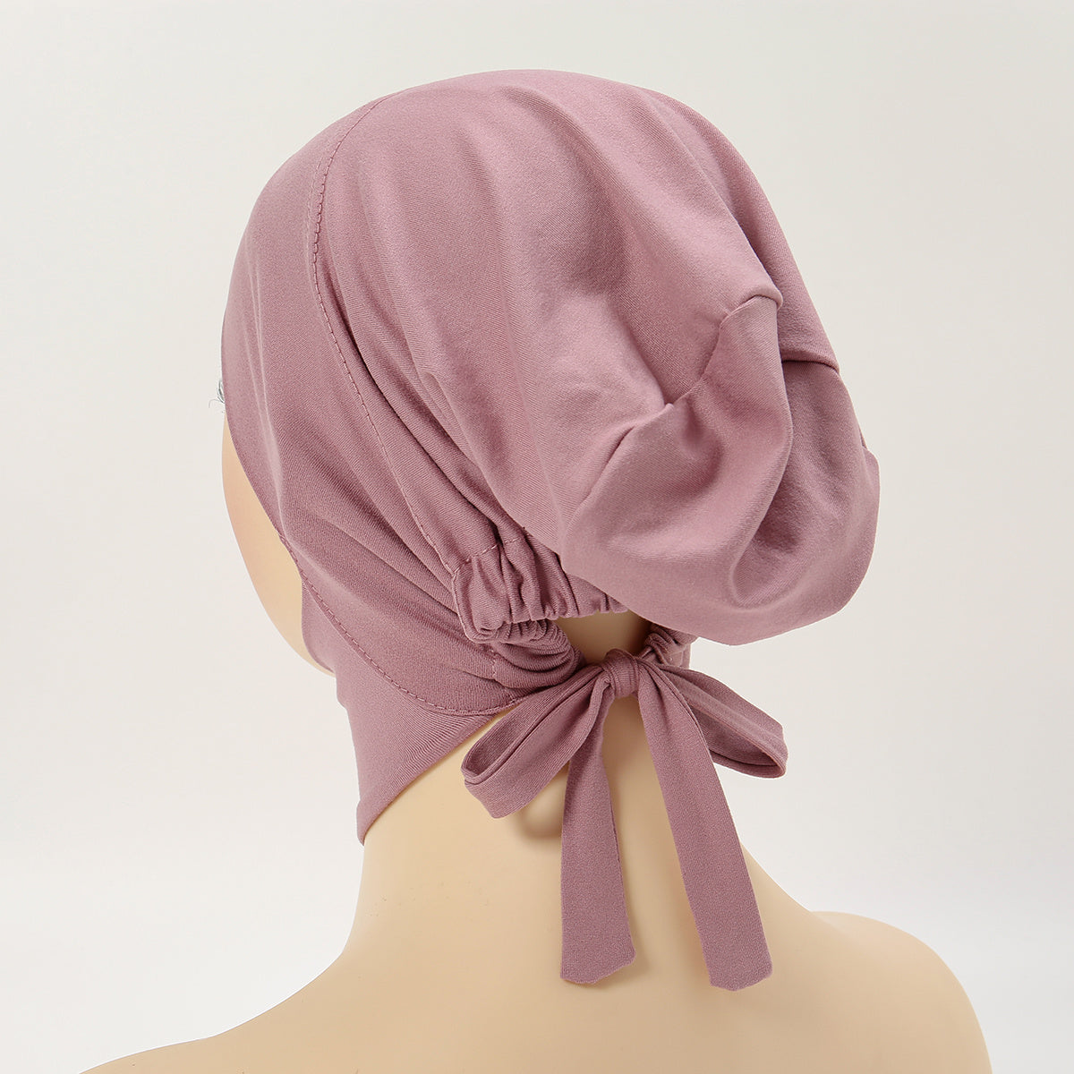 Adjustable women's instant hijab with undercap, solid color, machine washable, perfect for Eid and casual or religious wear. Made of polyester with flowing design.