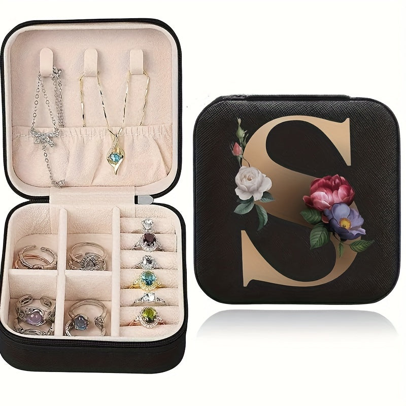 Floral initial jewelry organizer box with compact design, soft velvet lining, durable zipper, and lightweight, ideal for jewelry organization and travel.