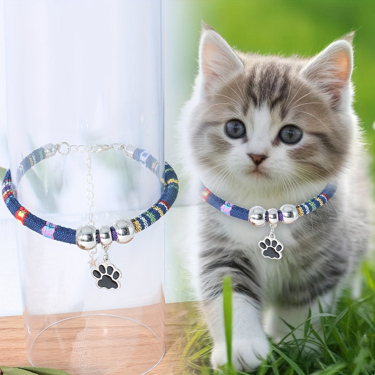 Durable, stylish, adjustable nylon pet necklace with colorful paw print pendant. Suitable for cats and small dogs.