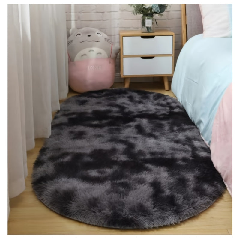 Soft faux fur oval area mat that is luxurious, plush, non-slip, hand washable, and durable. Perfect for adding a touch of elegance to your bedroom, living room, or home decor. Available in two sizes.