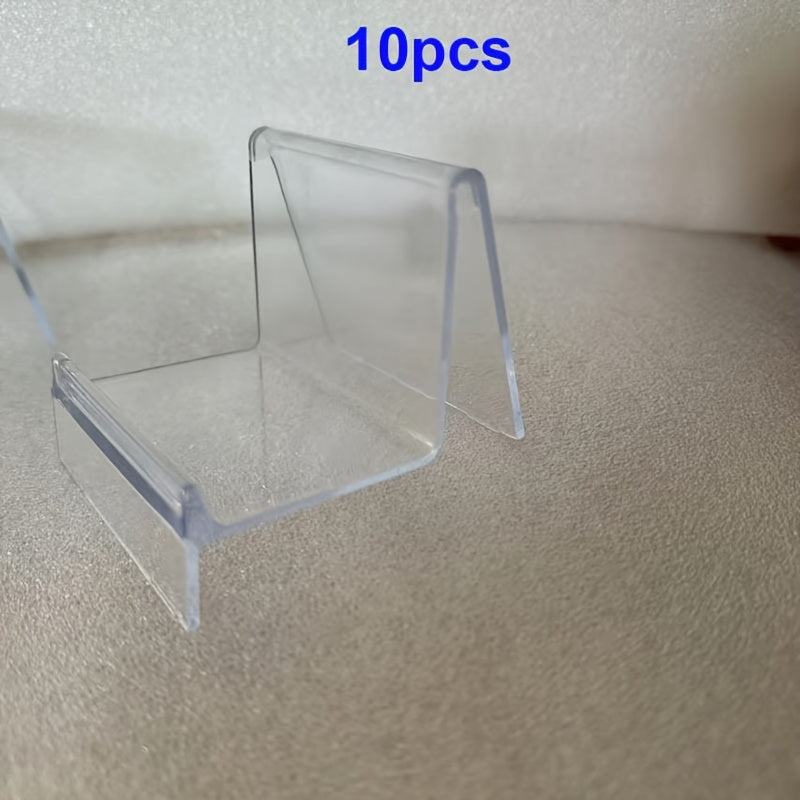 Clear Purse Display Stand, available in either a 5 or 10 piece set. Made from acrylic, this stand is perfect for showcasing wallets, glasses, clutches, handbags, or garage kits on shelves, in closets, or on retail countertops. Stay organized with this