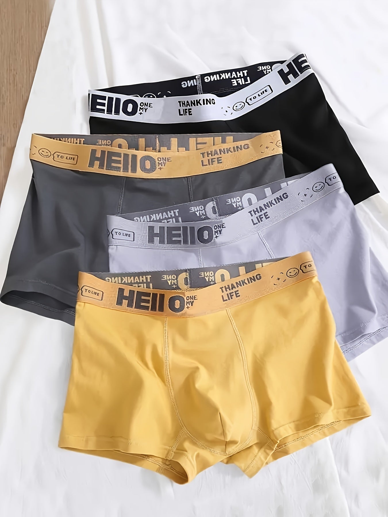 4 pack of men's trendy boxer shorts, breathable and comfortable, stylish and fashionable underwear.