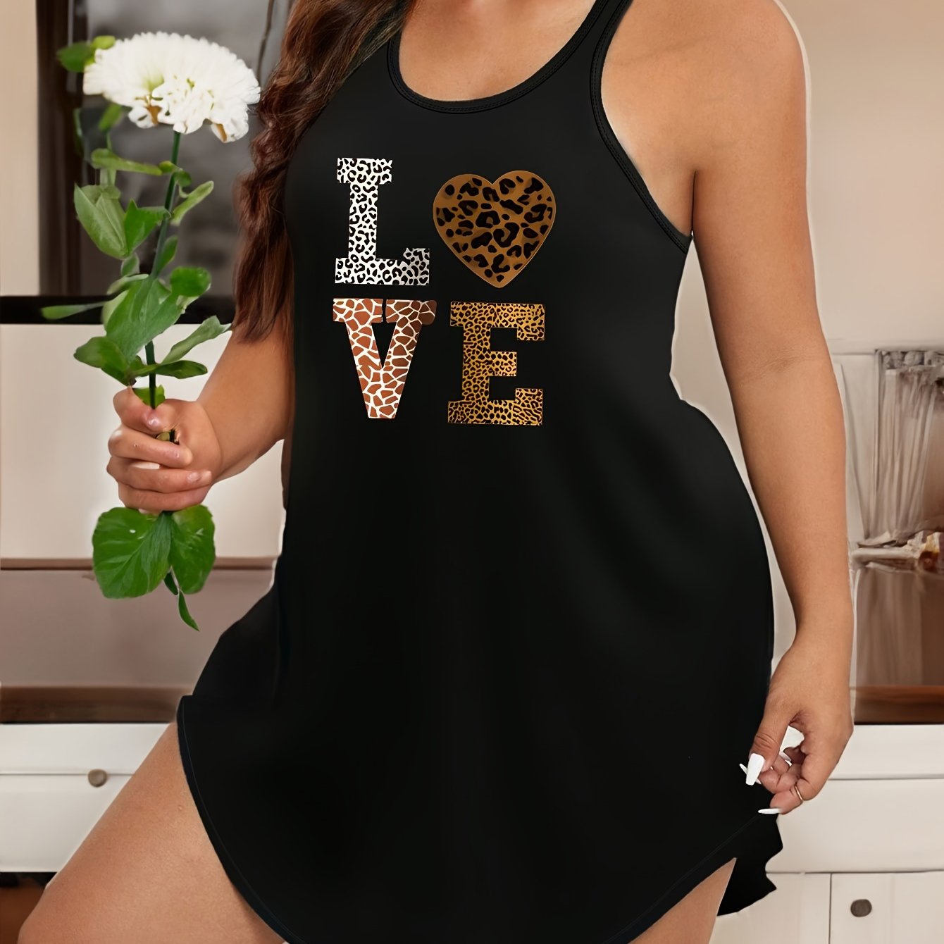 Semi-sheer leopard print tank dress with 'LOVE' lettering, round neck, and stretch fabric - machine washable.