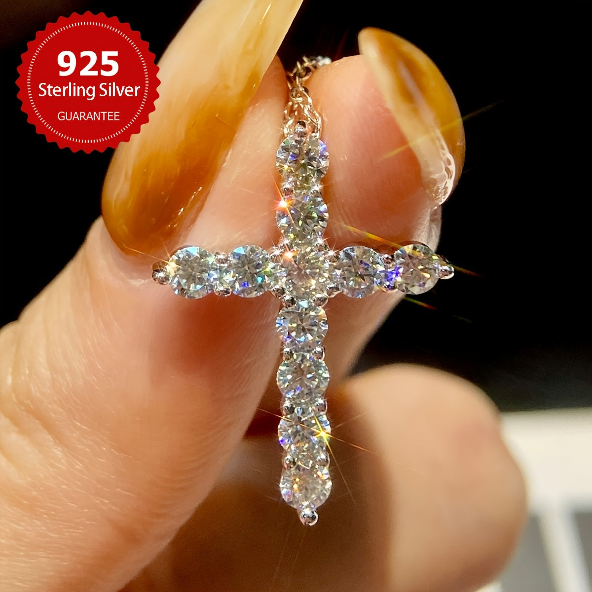 The stunning Mozambique stone cross pendant necklace features a 1.1 carat stone set in S925 sterling silver, making it a luxurious Valentine's Day gift for the special lady in your life. This exquisite piece of ladies' jewelry includes 11 0.1 carat