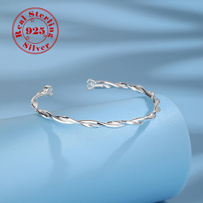 Elegant and simple twisted Möbius band bracelet for women, made of 925 sterling silver with white golden plating. This adjustable open cuff features synthetic zirconia and is hypoallergenic, weighing 9g. Perfect for daily wear or gifting.